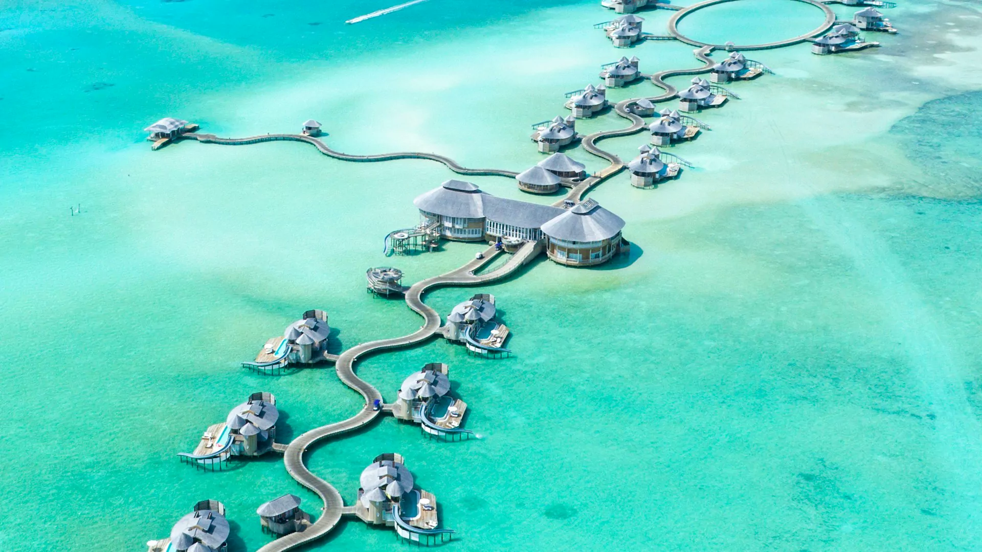 Overwater villas above a Maldives lagoon
